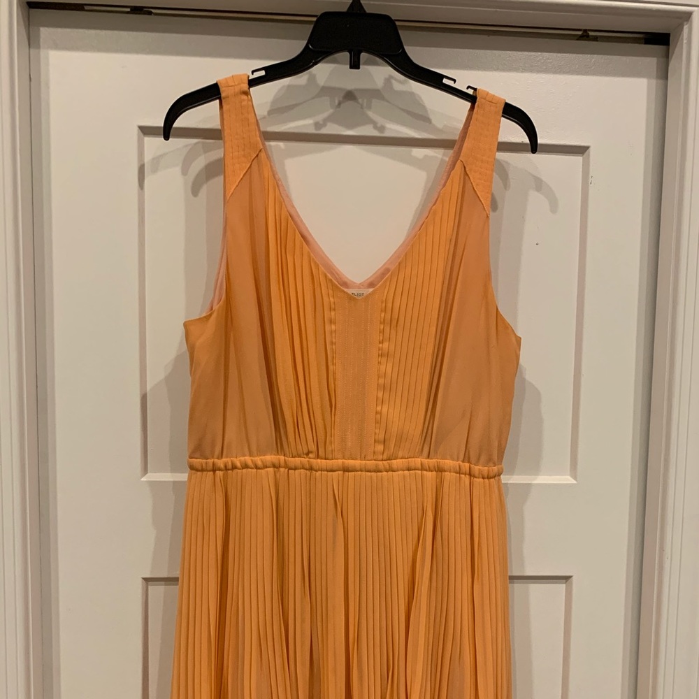 Orange pleated dress